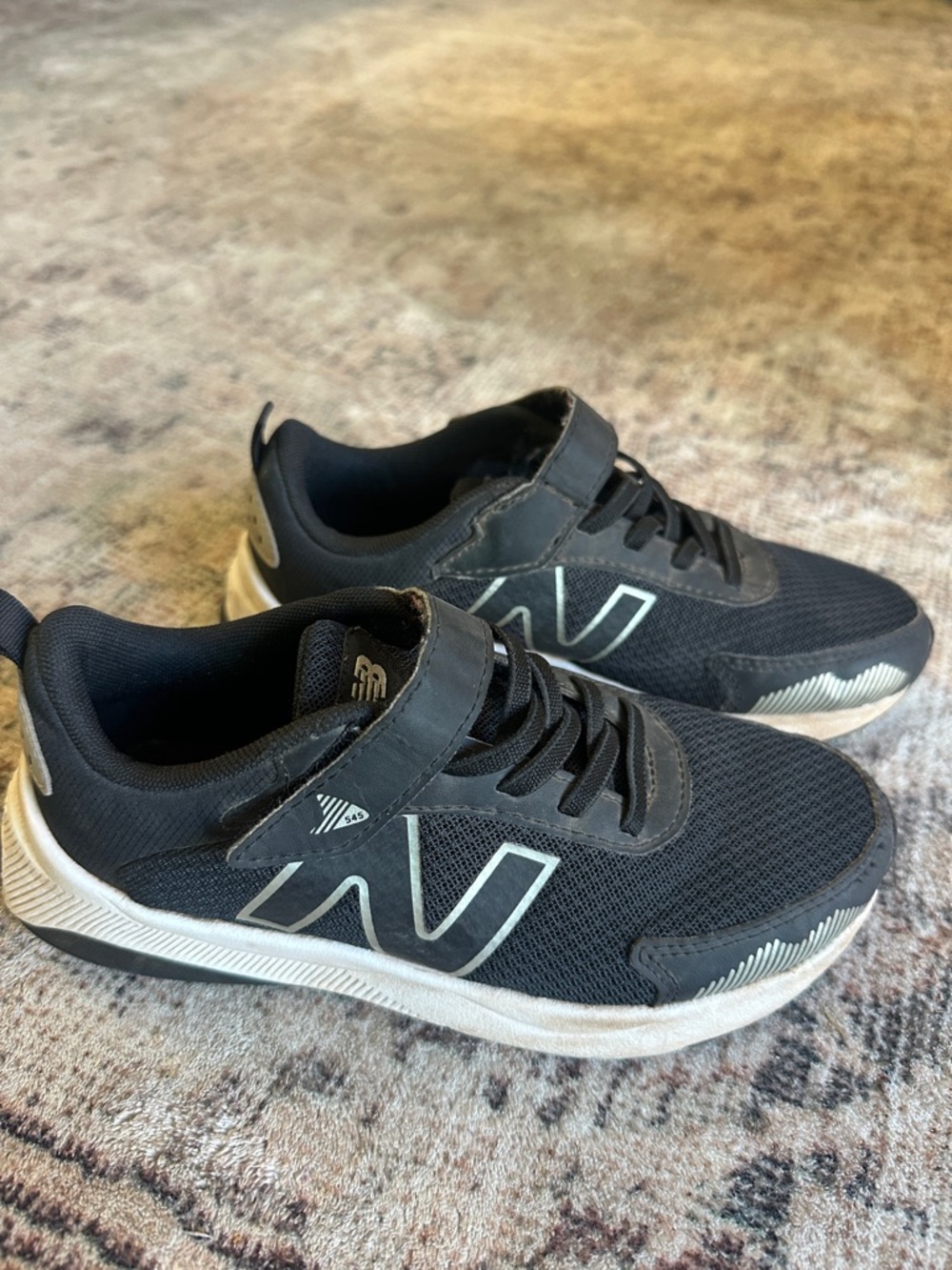 Kids New Balance Black Athletic Sneakers with White Sole - Velcro Closure
